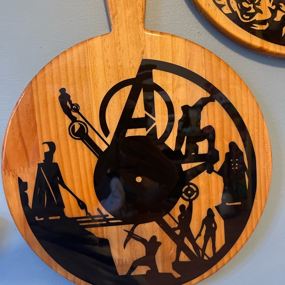 Wooden Wall Decor with Black Silhouette Design